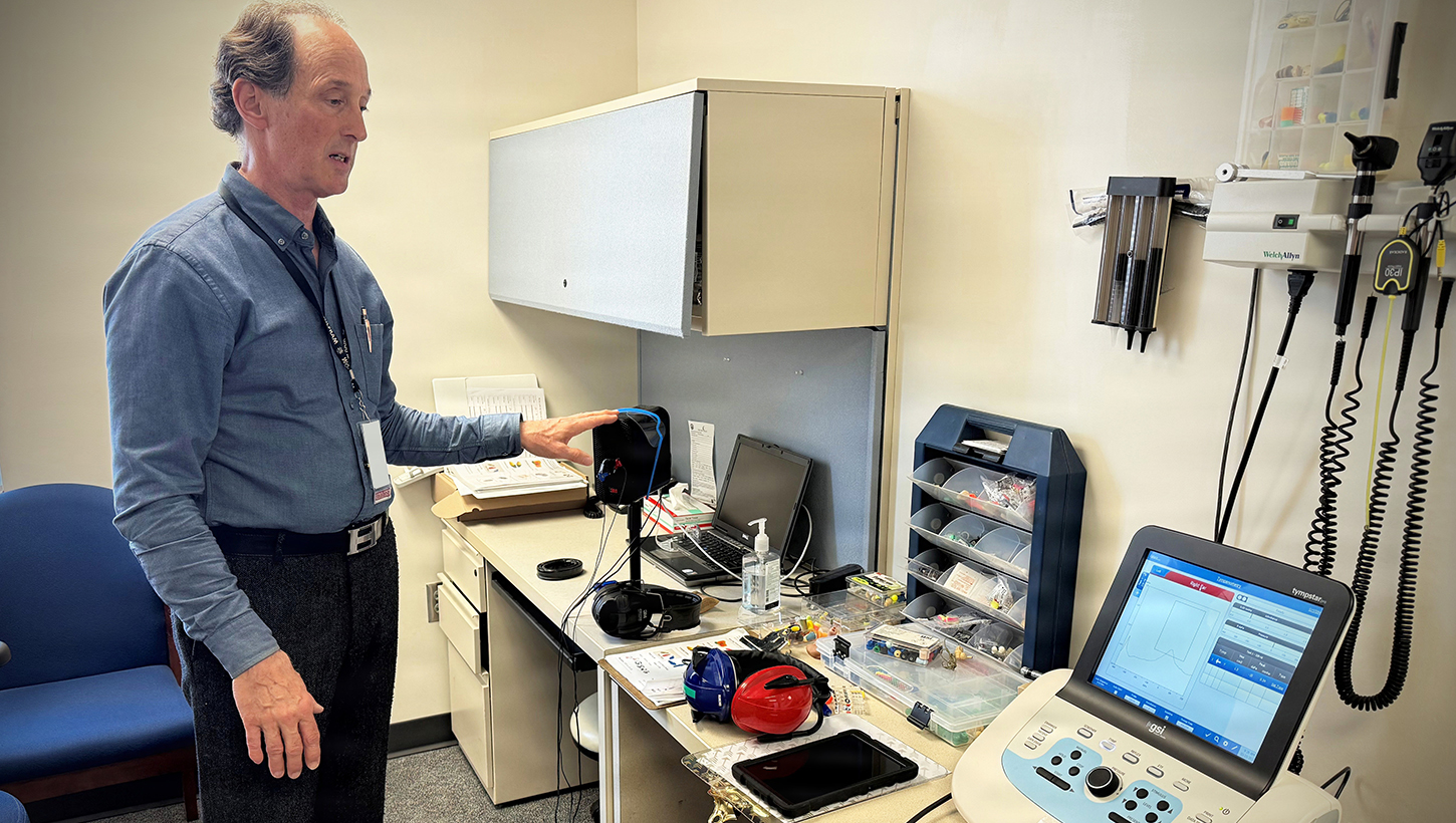 Dr. Jeffrey Russell, occupational audiologist with Naval Medical Center Camp Lejeune, discusses various hearing testing equipment at the Naval Medical Center Camp Lejeune Occupational Audiology Department. 