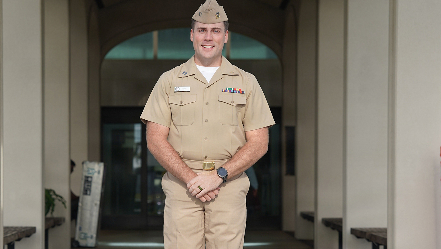 Lt. Jacob King, a pharmacist at U.S. Naval Hospital Guam, poses for a photo in front of the hospital