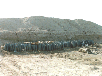 Figure 12. UNSCOM photograph of Iraqi 155mm mustard rounds of Khamisiyah