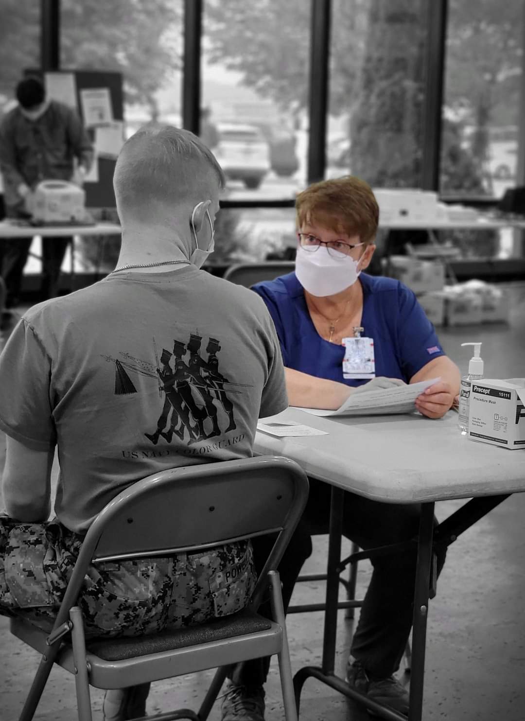 Finola Brophy-Houlihan, Armed Services Blood Bank Center - National Capital Region, reviews donor information prior to approving the service member for blood donation. (Photo: Donna Onwona)