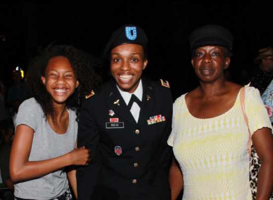 Captain R. J. (Jody) Reid with mom and daughter