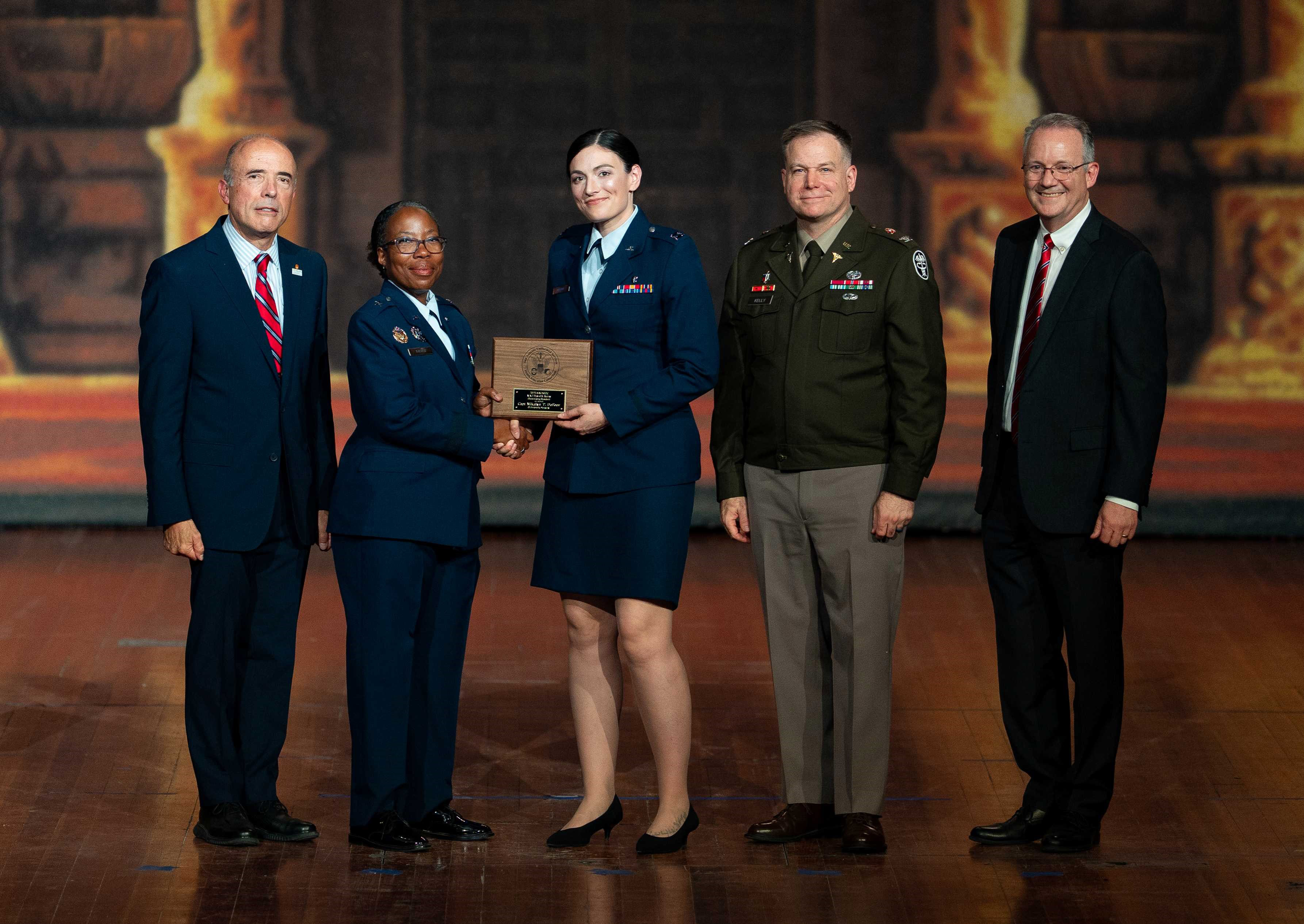Image of SAUSHEC residents, fellows celebrate their achievement at graduation ceremony.