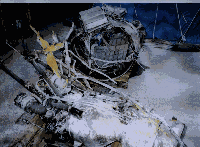 Figure 7. The Recovered SCUD's Guidance Section & Rocket Motor (rocket motor is in the foreground)