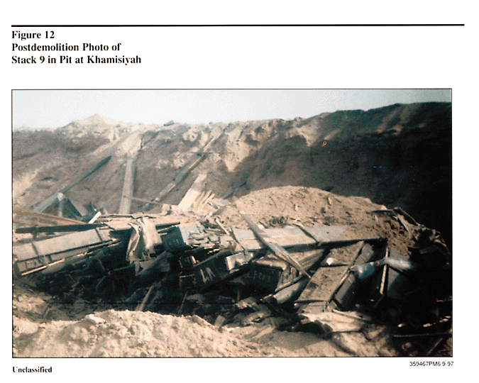 Figure 12. Postdemolition Photo of Stack 9 in Pit at Khamisiyah