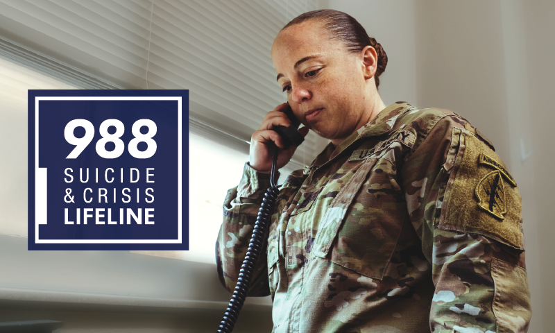 Woman in uniform talking on the phone. 988 Suicide & Crisis Lifeline. Links to: https://www.health.mil/News/In-the-Spotlight/988