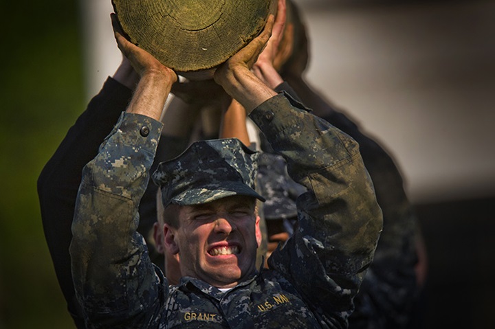 Image of Midshipmen from the U.S Naval Academy Class of 2016 conduct a log carrying exercise.