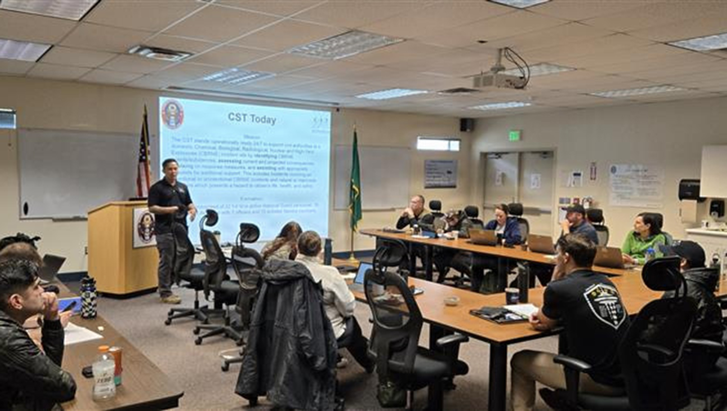 Maj. Jaymar Imperial, Operations Officer, 10th Civil Support Team gives a briefing during a multi-agency Radiation Response Workshop