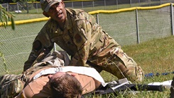 U.S. Air Force Lt. Col. Emile Fernando, 185th Air Refueling Wing Medical Group physician’s assistant, conducts tactical combat casualty care on a simulated patient