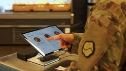 A soldier orders a meal at Market 19 at Camp Walker, South Korea, Nov. 7, 2025. Market 19