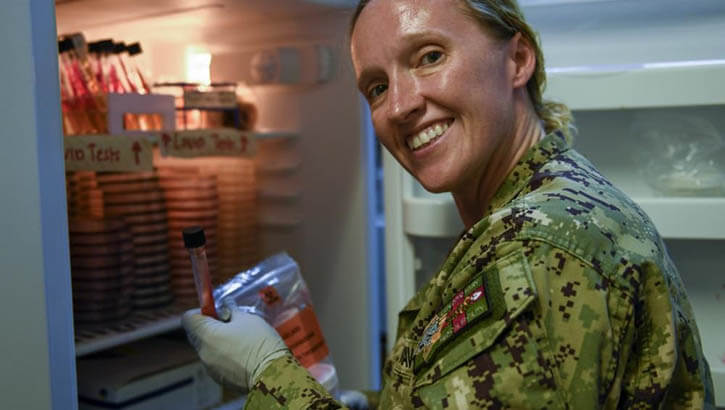 Military personnel at microbiology lab