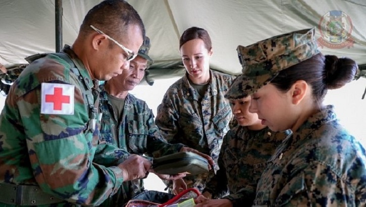 U.S. and Thai soldiers stand together during a medical exercise. 