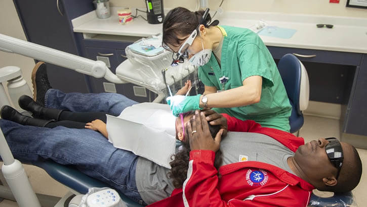 A child receives dental treatment during the “Give Kids a Smile” day event March 9, 2019, held by the 375th Dental Squadron clinic on Scott Air Force Base, Illinois. Children registered for the event were given the chance to receive cleanings, fillings, and more at no cost to their parents. (Photo: Airman 1st Class Isaiah Gonzalez, 375th Air Mobility Wing Public Affairs)
