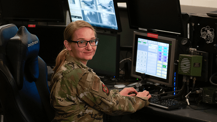 Military personnel at computer 