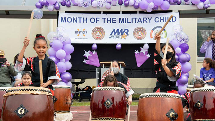 Image of Shirley Lanham Elementary School students perform Taiko drumming during a Month of the Military Child celebration aboard the Naval Air Facility Atsugi, Japan, April 6, 2022. (Photo: Petty Officer 2nd Class Ange-Olivier Clement, Naval Air Facility Atsugi). Click to open a larger version of the image.