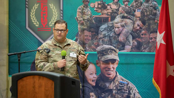 Soldier speaks at podium
