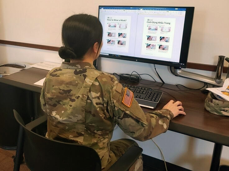 A Guardsmen with the 341st Military Intelligence Battalion conducts translation work on a safety message regarding the best practices for avoiding the novel coronavirus for the Washington Department of Health on Feb. 9, 2020 at the Information Operations Readiness Center, Joint Base Lewis-McChord, Wash. (Courtesy Photo)