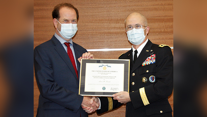 Image of U.S. Army Lt. Gen. (Dr.) Ronald J. Place  and Dr. Louis French at award ceremony.