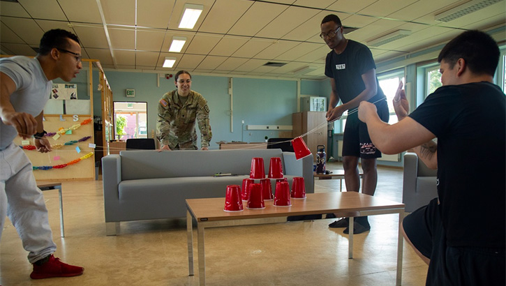 Soldiers participate in a group activity at the 254th Combat and Operational Stress Control Medical Detachment Restoration and Reconditioning Center in Grafenwoehr, Germany, on Aug. 16, 2023. The center offers a five-day structured program where service members with combat operational stress reactions are taught enhanced coping strategies and problem-solving techniques. (U.S. Army photo by Spc. Thomas Dixon)