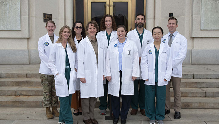 Walter Reed National Military Medical Center physician assistants pose for a group photo in front of Walter Reed's Tower in Bethesda, Maryland, Oct. 6, 2023. The physician assistants came together in recognition of National Physician Assistants Week. (U.S. Navy photo by Mass Communication Specialist 2nd Class Brett Walker)