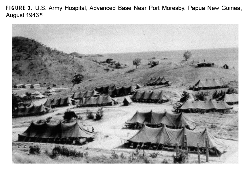 FIGURE 2. U.S. Army Hospital, Advanced Base Near Port Moresby, Papua New Guinea, August 1943 This is a historical, black-and-white photograph that depicts a U.S. Army field hospital near Port Moresby, New Guinea, in August 1943. The image shows a large encampment of medical tents on a flat, dirt clearing, with a background of dense, hilly jungle. The purpose of the photograph is to illustrate the austere and challenging conditions of providing medical care in a forward-deployed, combat environment during World War II.
