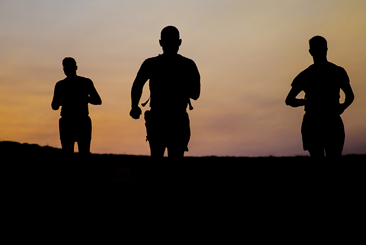 Image of U.S. Marines participate in morning physical training during a field exercise at Marine Corps Base Camp Pendleton, California. (Photo Courtesy: U.S. Marine Corps). Click to open a larger version of the image.