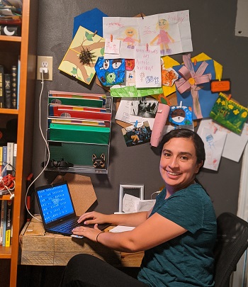 Image of woman at home desk