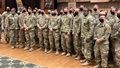 Military personnel posing for a picture