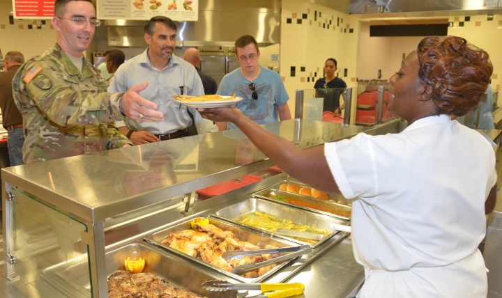 Soldiers and civilian personnel choose food items from the new Tactical Human Optimization, Rapid Rehabilitation and Reconditioning (THOR 3) menu, at the U.S. John F. Kennedy Special Warfare Center and School dining facility, at Fort Bragg, North Carolina. The dining facility is employing U.S. Army Special Operations Command's THOR 3 nutrition program and collecting data to assess its effectiveness for Army Special Operations Forces Soldiers. (Photo by Sgt. Kyle Fisch, USASOC Public Affairs)