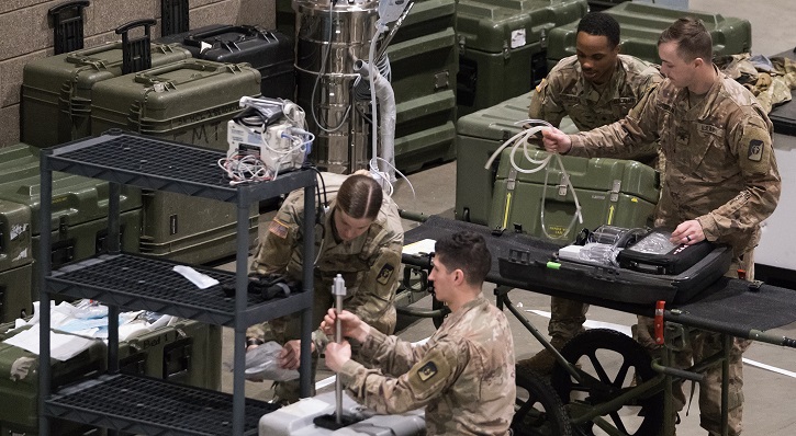 Image of soldiers unpacking equipment