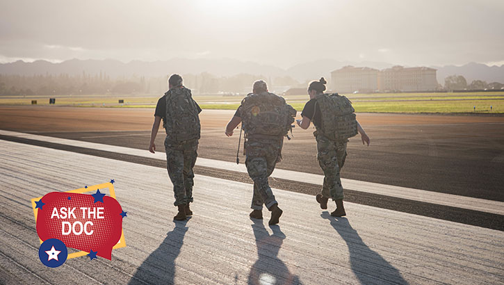 Image of Soldiers conduct a ruck march on airfield. Click to open a larger version of the image.