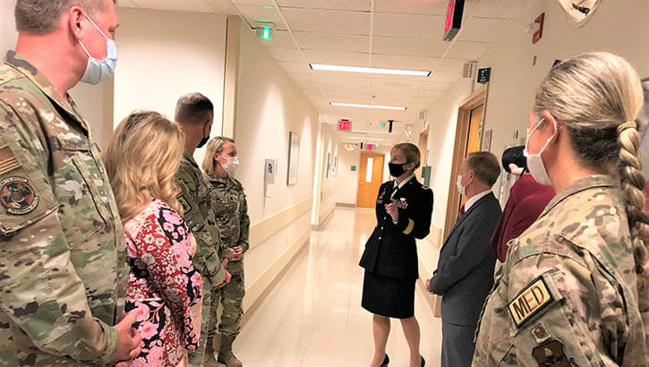 Army Brig. Gen. Katherine Simonson, Defense Health Agency Deputy Assistant Director of the Research and Engineering Directorate, and Dr. Barclay Butler, Assistant Director for Management, DHA, talks with Army Lt. Col. Samantha Rodgers, Ophthalmology chief (left), during a tour and designation ceremony April 19 at the Ocular Trauma Center – San Antonio Region, Brooke Army Medical Center, Fort Sam Houston, Texas. The designation ceremony marked the launch of DHA’s first Ocular Trauma Center, comprised of personnel from Brooke Army Medical Center and the 59th Medical Group. (Photo: Larine H. Barr, DOD) 