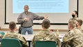 Chuck Satterfield and Staff Sgt. Lori Fury hosting a training