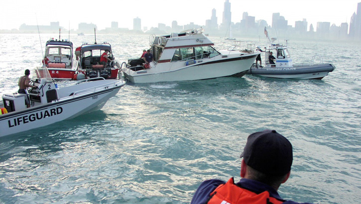 Image of Military personnel conducting boating safety patrols. Click to open a larger version of the image.