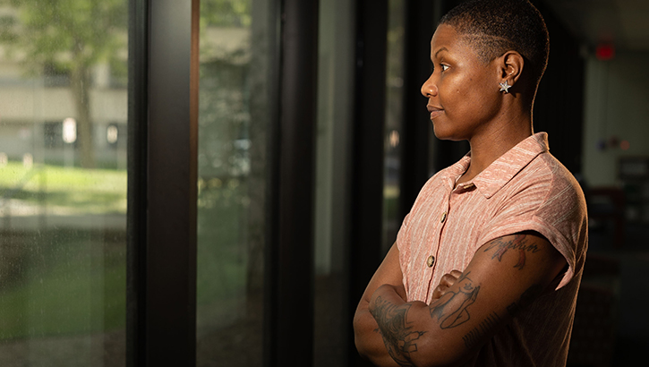 Stephanie Bowens, a former Marine, cancer survivor, and nursing administrator, contemplates her day at Walter Reed Military Medical Center, preparing for an upcoming breast reconstruction surgery. (Photo: Ricardo Reyes-Guevara, Walter Reed Military Medical Center)