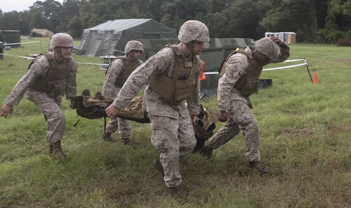 Sailors with 2nd Medical Battalion, 2nd Marine Logistics Group carry a simulated casualty as part of a field exercise at Camp Lejeune, N.C. The battalion was conducting the exercise to enhance overall unit readiness. (U.S. Marine Corps photo by Lance Cpl. Dalton Precht) 