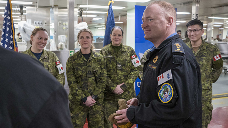 Canadian armed forces personnel aboard the Military Sealift Command hospital ship USNS Comfort