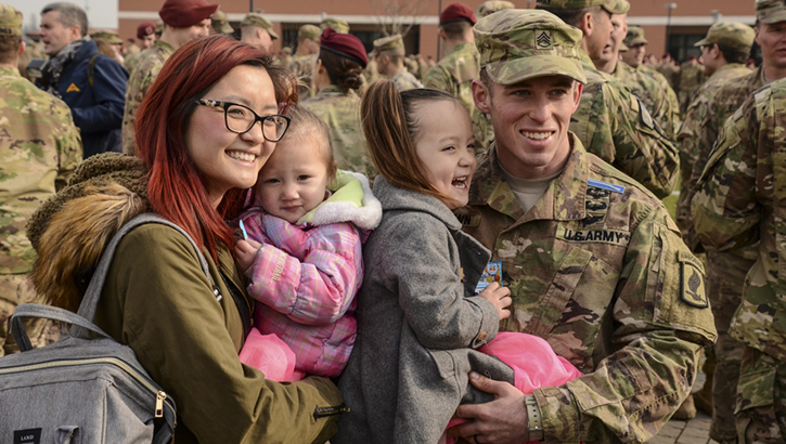 Military family posing for a picture