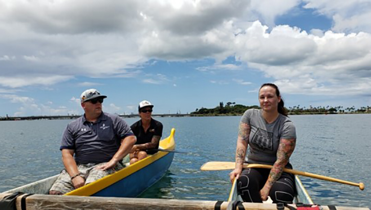 Caregiver Stacey Rivera and Navy Wounded Warrior staff canoe around Joint Base Pearl Harbor Hickam during the Military Caregiver Workshop. (Photo by Gabrielle Arias, Peer Support Coordinator, DHA Recovery Care Program, San Diego)