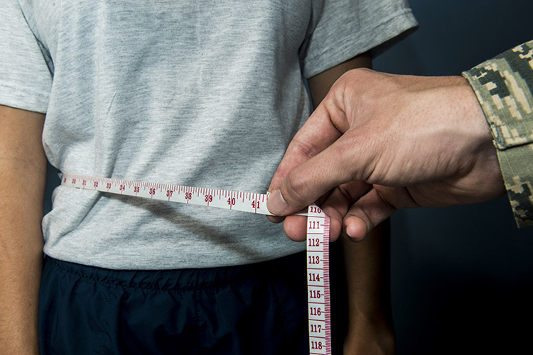 Maintaining a healthy weight is important for military members to stay fit to fight. The body mass index is a tool that can be used to determine if an individual is at an appropriate weight for their height. A person’s index is determined by their weight in kilograms divided by the square of height in meters. (U.S. Air Force photo illustration by Airman 1st Class Destinee Sweeney)