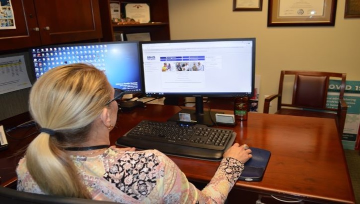 Image of Elaine Sanchez explores the new MHS GENESIS Patient Portal at Brooke Army Medical Center, Joint Base San Antonio-Fort Sam Houston, Texas, Oct. 6, 2021. The San Antonio Market will transition to the new electronic health record system – known as MHS GENESIS – in January 2022.