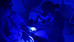 Cmdr. Michelle McCormick, left, a Sexual Assault Medical Forensic Examiner (SAMFE) instructor from Navy Medicine Training Support Command San Antonio, conducts a simulated exam for Lt. Jennifer Stephens