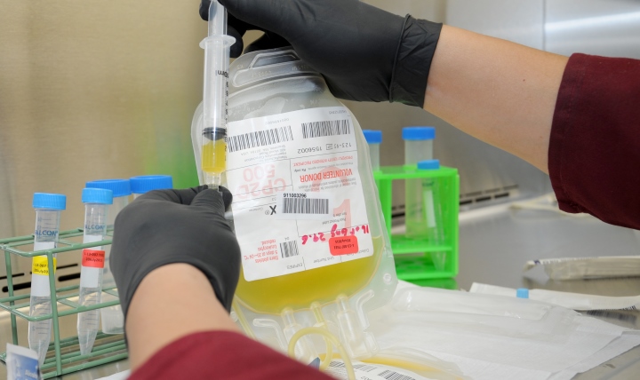 A technician draws platelets to prepare them for a series of tests to determine platelet function at the U.S. Army Institute of Surgical Research, Fort Sam Houston, Texas. (U.S. Army photo by Steven Galvan)