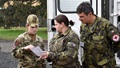 Military personnel at simulated trauma training