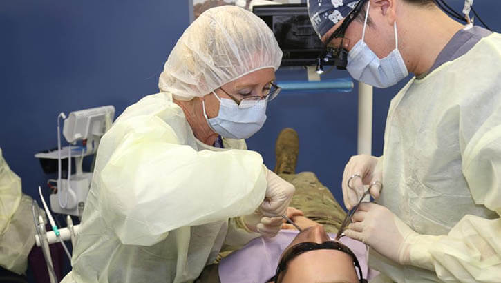 Medical personnel during a procedure