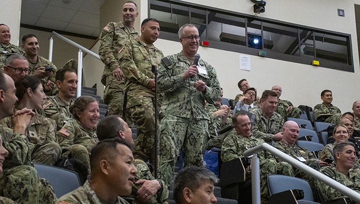A military medical leader asks a question of a presenter during the plenary session of the annual Joint Graduate Medical Education Selection Board held at the Uniformed Services University of the Health Sciences in Bethesda, Maryland the week of Nov. 18 – 22.