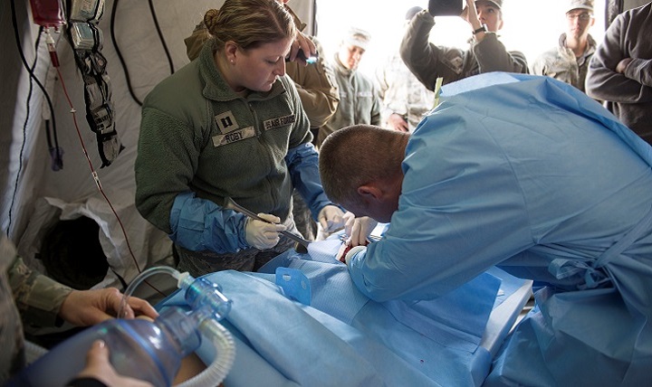 A surgical team rushes into action on a simulated injury during Gunfighter Flag 16-1 at Mountain Home Air Force Base, Idaho.