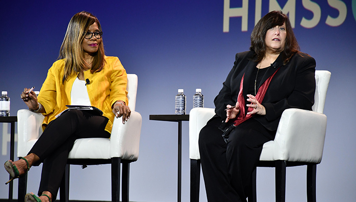 Image of Dr. Terry Adirim, acting assistant secretary of defense for health affairs, right, speaks during a panel discussion. Click to open a larger version of the image.