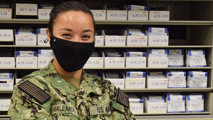 Female soldier wearing a black mask
