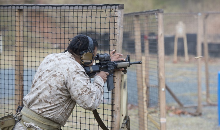 A Marine fires a M27 Infantry Automatic Rifle, at Marine Corps Base Quantico, Virginia. 