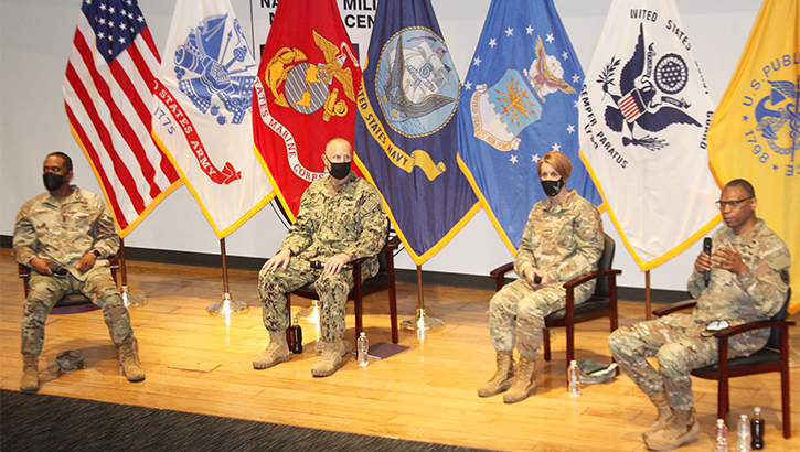 A panel of military personnel 